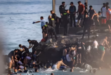 At least 18 die as thousands cross into Spain from Morocco