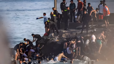 At least 18 die as thousands cross into Spain from Morocco